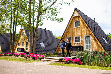 Couple at a holiday villa at the Villapark Hof van Salland holiday park