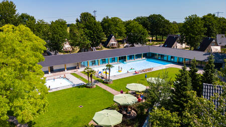 Aerial view of the outdoor pool and paddling pool of Villapark Hof van Salland