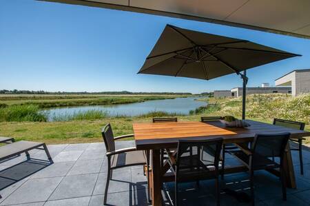 Terrace of a luxury villa at Z'andvillas De Groote Duynen