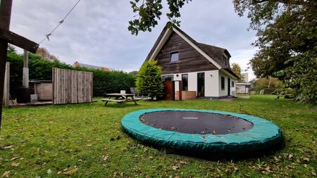 Trampoline in the garden of a family villa at Bungalowpark 't Hoogelandt