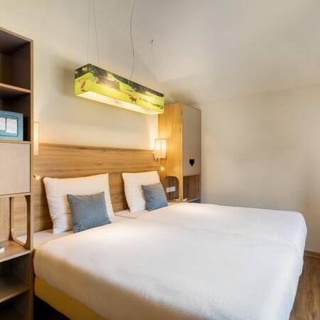 The accommodations have luxurious bedrooms at Center Parcs Park Allgäu